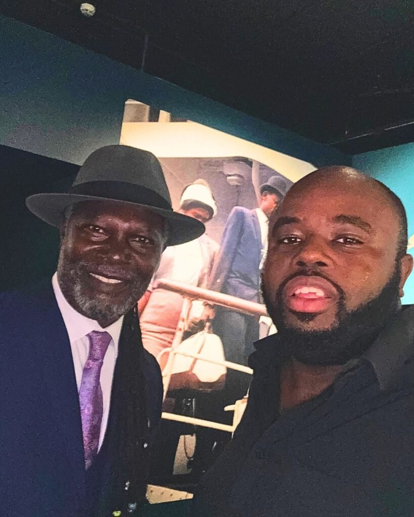 Levi Roots with CEO of BridgeGap Media taking a selfie during the Windrush Food Culture event at the National Maritime Museum.