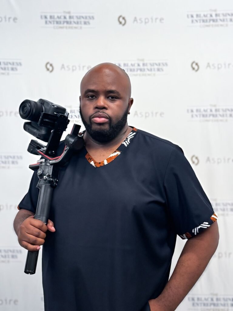 BridgeGap Media videographer covering the UK Black Business Entrepreneurs Conference 2025 in London.